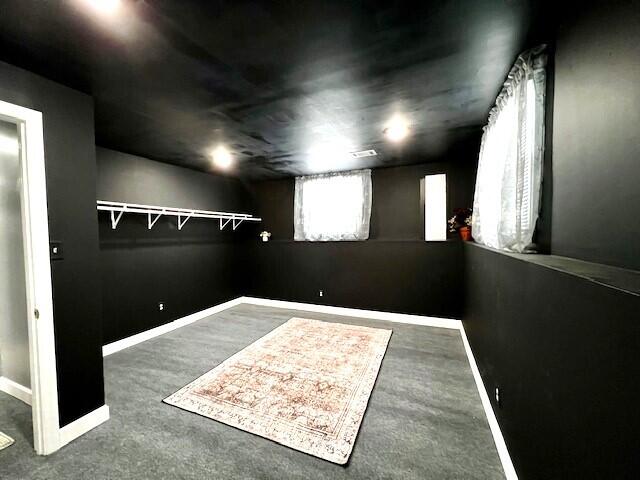interior space featuring baseboards