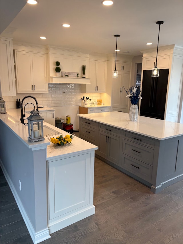 1219 N Main St, Rochester, MI 48307 - kitchen featuring open shelves, black refrigerator, white cabinetry, a peninsula, and gray cabinetry