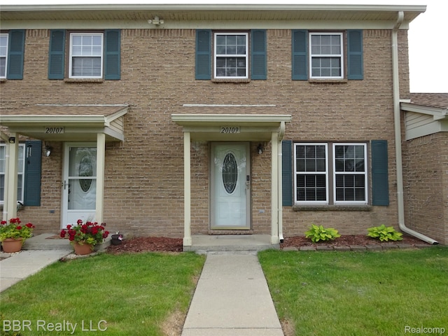20109 Cumberland, Brownstown, MI 48183 - view of front of home featuring a front lawn and brick siding