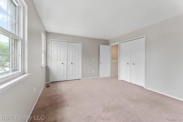 20109 Cumberland, Brownstown, MI 48183 - unfurnished bedroom with multiple closets and carpet floors