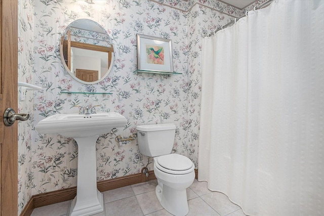 16396 M-89, Augusta, MI 49012 - bathroom with baseboards, wallpapered walls, tile patterned floors, and toilet