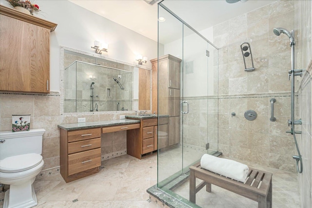 16396 M-89, Augusta, MI 49012 - full bathroom with tile walls, toilet, a stall shower, and vanity