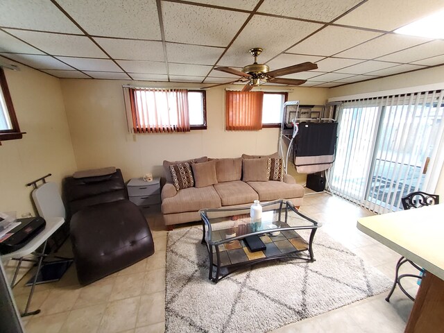 2415 Needham St, Saginaw, MI 48601 - living room with ceiling fan and a drop ceiling