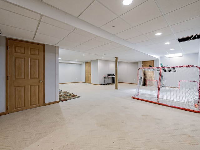 finished below grade area featuring carpet floors, baseboards, and recessed lighting