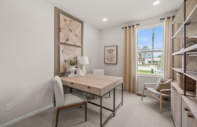 office area featuring light carpet, baseboards, and recessed lighting