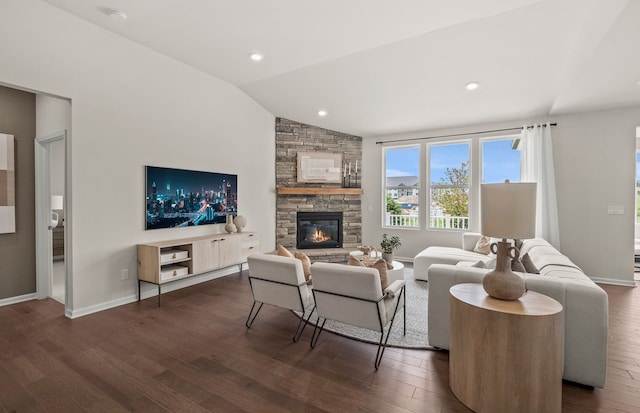 living area with dark wood-style floors, lofted ceiling, baseboards, and a fireplace