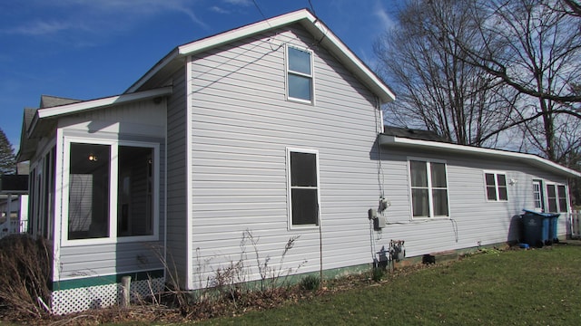 185 Henry St, Coldwater, MI 49036 - view of side of home featuring a yard
