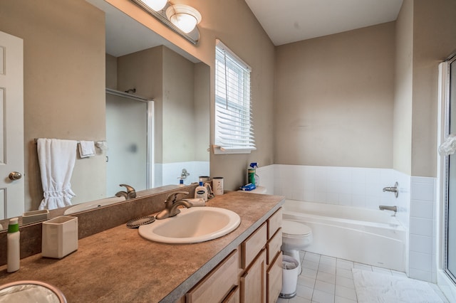 full bath featuring vanity, tile patterned floors, toilet, a stall shower, and a garden tub