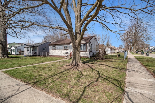 26410 Beverly Rd, Taylor, MI 48180 - view of front of property with a residential view and a front lawn