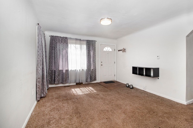 26410 Beverly Rd, Taylor, MI 48180 - entryway featuring carpet flooring and baseboards