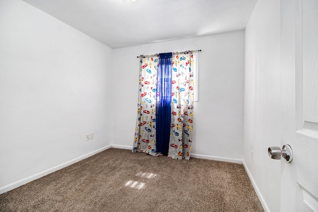 26410 Beverly Rd, Taylor, MI 48180 - carpeted empty room with baseboards