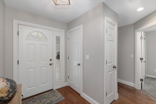 33172 Swallow Dr, Rockwood, MI 48173 - entrance foyer with baseboards and dark wood-type flooring