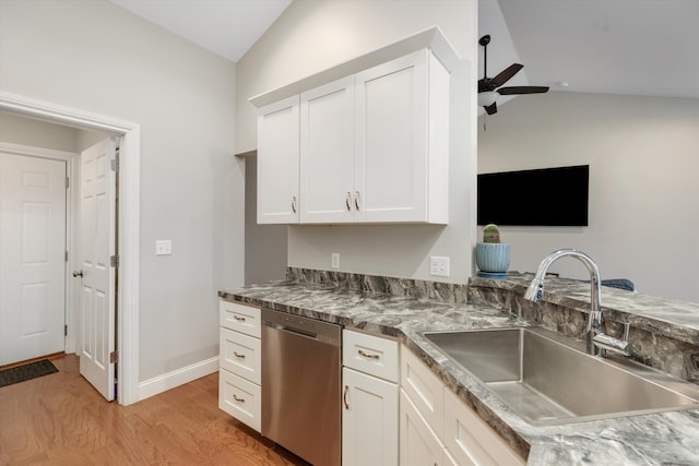 33172 Swallow Dr, Rockwood, MI 48173 - kitchen featuring vaulted ceiling, a ceiling fan, a sink, light wood-style floors, and dishwasher