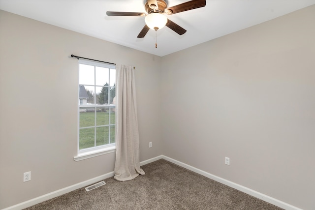33172 Swallow Dr, Rockwood, MI 48173 - empty room featuring plenty of natural light, visible vents, carpet flooring, and baseboards