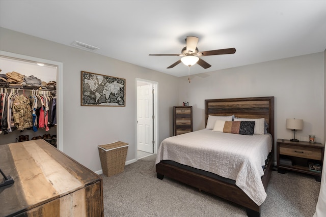 33172 Swallow Dr, Rockwood, MI 48173 - carpeted bedroom with baseboards, visible vents, a spacious closet, a ceiling fan, and a closet