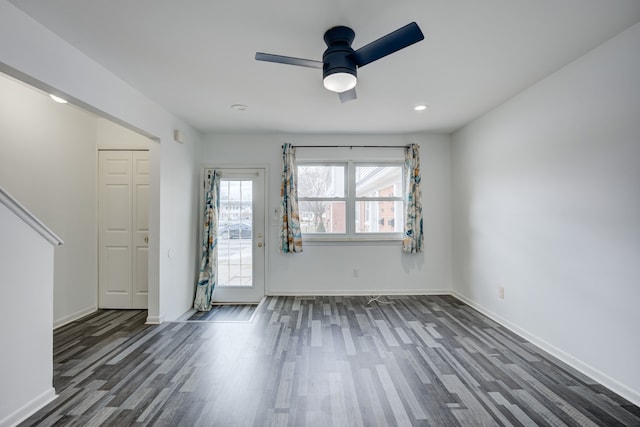unfurnished room with baseboards, wood finished floors, recessed lighting, and a ceiling fan