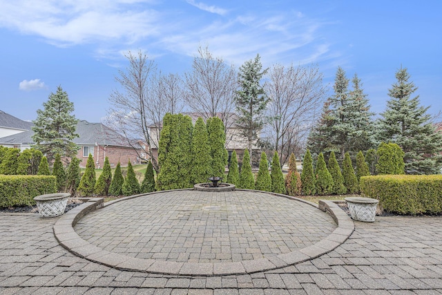 view of patio featuring a fire pit