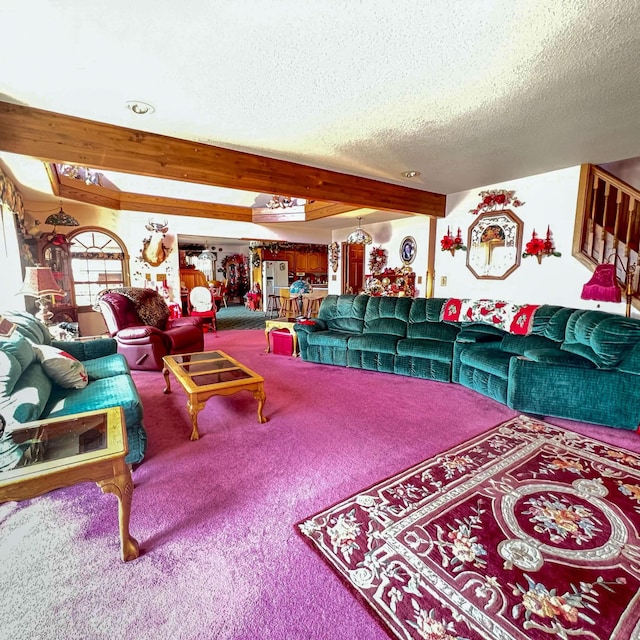 living room featuring a textured ceiling, carpet flooring, and beam ceiling