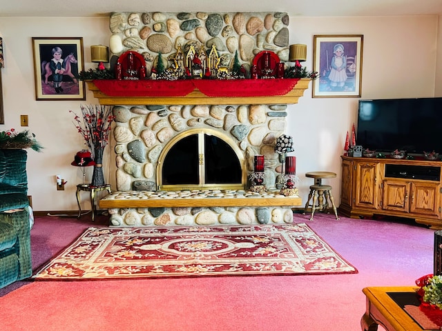 living room with carpet flooring, baseboards, and a stone fireplace