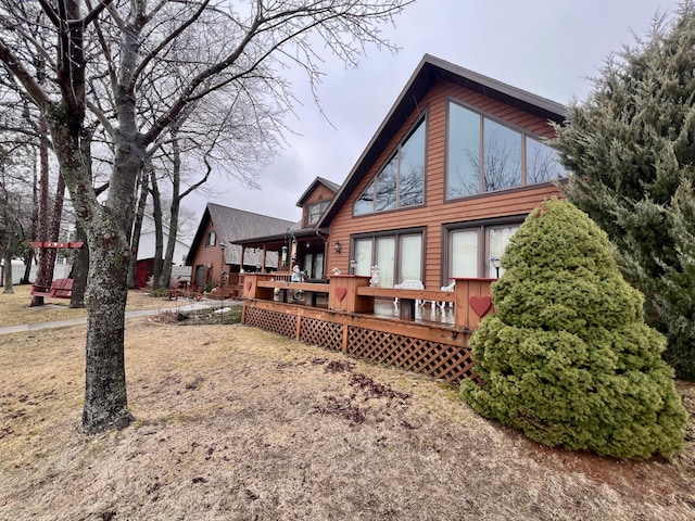 rear view of house with a deck