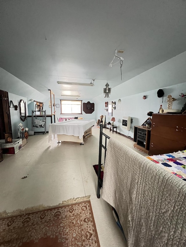 bedroom featuring concrete flooring