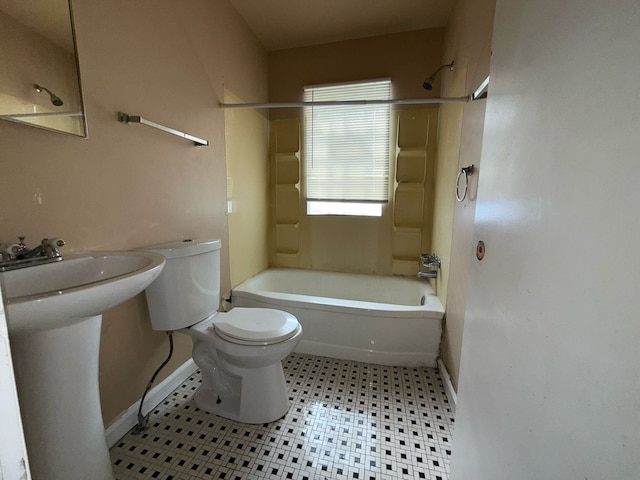 20561 Alcoy St, Detroit, MI 48205 - full bathroom with baseboards, a sink, washtub / shower combination, and toilet