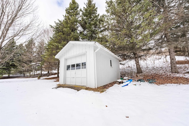 view of snow covered garage