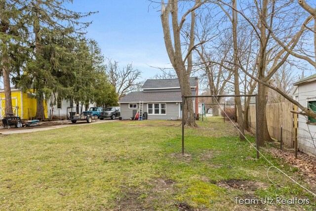 view of yard with fence