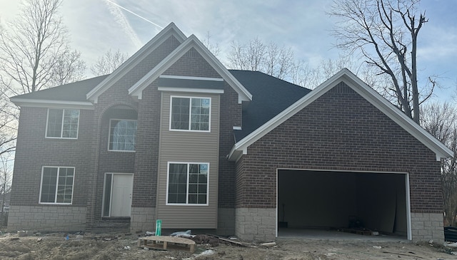 exterior space featuring entry steps, an attached garage, and brick siding