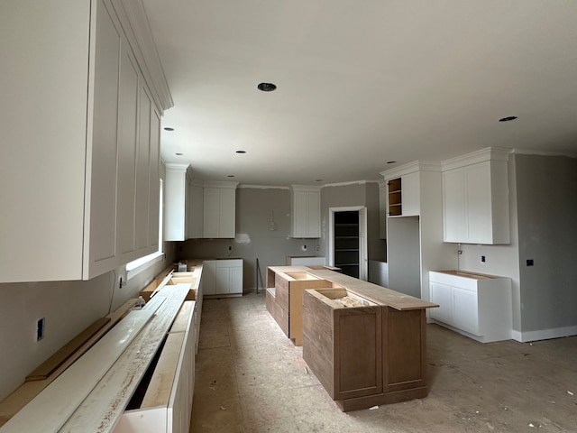 kitchen featuring white cabinetry and a kitchen island