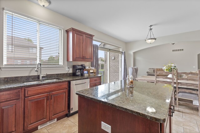 18277 Crenshaw Dr, Macomb, MI 48042 - kitchen featuring dishwasher, a sink, light tile patterned floors, and healthy amount of natural light