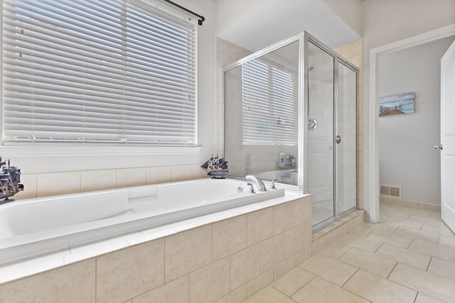 18277 Crenshaw Dr, Macomb, MI 48042 - bathroom with a stall shower, tile patterned flooring, a bath, and healthy amount of natural light