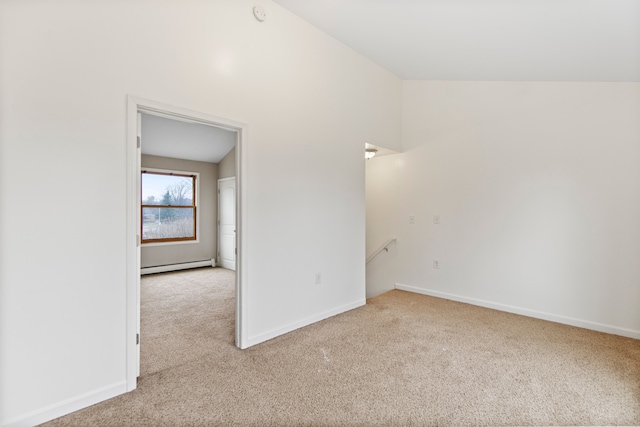 142 E Glass Rd, Ortonville, MI 48462 - spare room featuring baseboards, a baseboard heating unit, and carpet