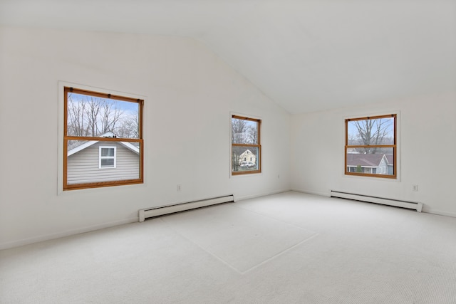 142 E Glass Rd, Ortonville, MI 48462 - carpeted spare room with a baseboard radiator and vaulted ceiling