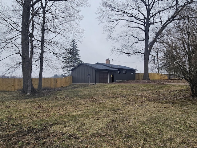view of yard with fence