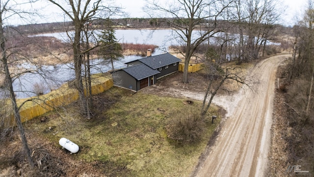 aerial view featuring a water view