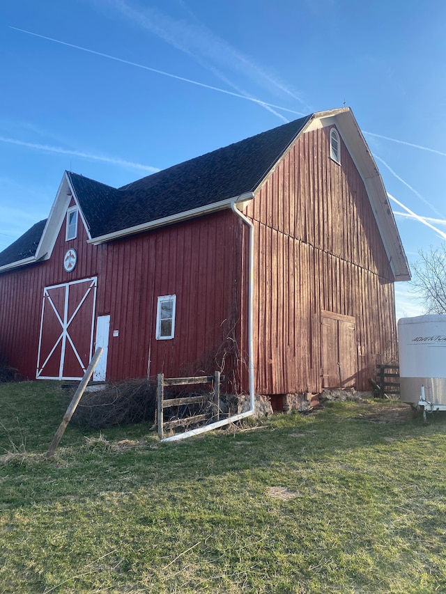 8162 Groveland Rd, Holly, MI 48442 - view of barn with a lawn