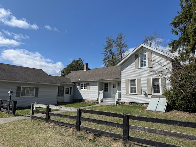 8162 Groveland Rd, Holly, MI 48442 - view of front of house featuring a chimney