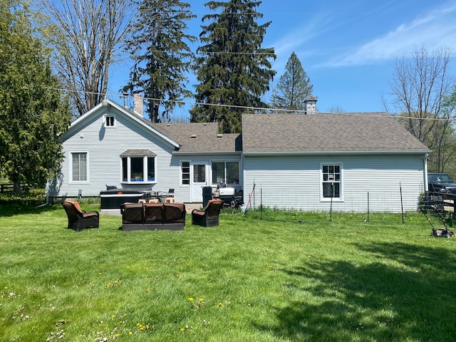 8162 Groveland Rd, Holly, MI 48442 - rear view of house with a chimney, a yard, outdoor lounge area, and roof with shingles