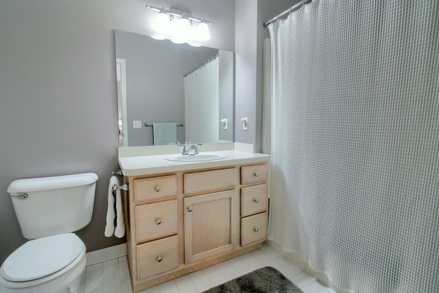 full bathroom with toilet, a shower with curtain, tile patterned flooring, and vanity