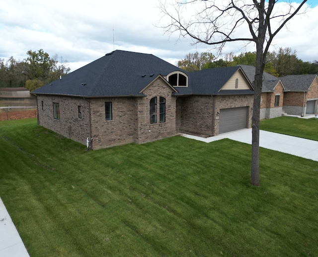 21812 Duns Scotus St # 7, Southfield, MI 48075 - french provincial home with brick siding, driveway, a front lawn, a garage, and roof with shingles
