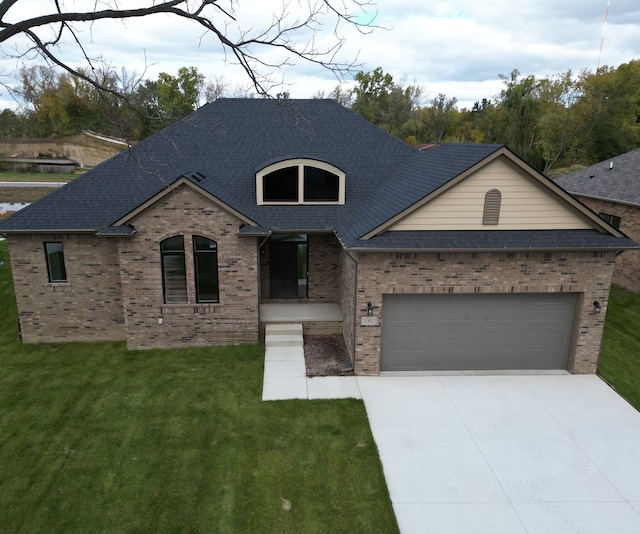 21812 Duns Scotus St # 7, Southfield, MI 48075 - french provincial home with brick siding, roof with shingles, a garage, and a front lawn