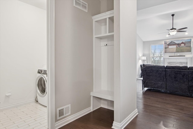 30909 Asbury Hill Ct, New Hudson, MI 48165 - mudroom with dark wood-style floors, ceiling fan, visible vents, and washer / dryer