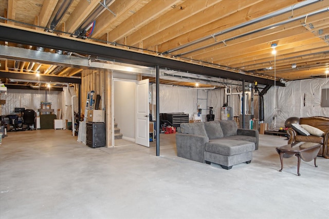 30909 Asbury Hill Ct, New Hudson, MI 48165 - unfinished below grade area featuring water heater and stairs