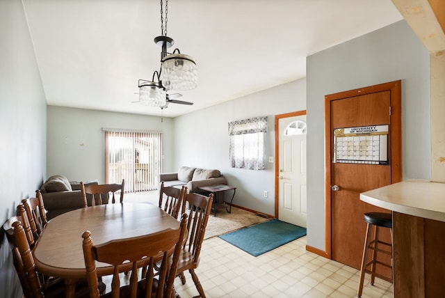 2981 Harrison St, Saginaw, MI 48604 - dining room with baseboards and ceiling fan