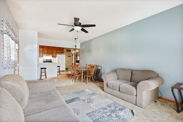 2981 Harrison St, Saginaw, MI 48604 - living area with baseboards and a ceiling fan