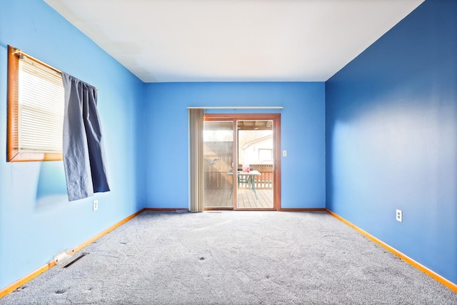 2981 Harrison St, Saginaw, MI 48604 - carpeted spare room with baseboards and visible vents