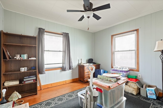 2981 Harrison St, Saginaw, MI 48604 - office area with baseboards, ceiling fan, and wood finished floors
