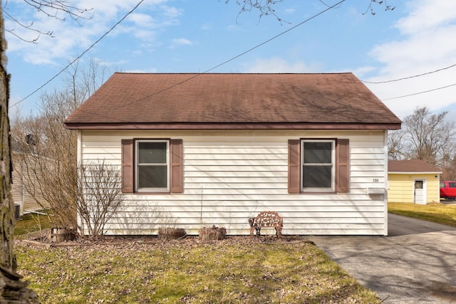 2981 Harrison St, Saginaw, MI 48604 - view of home's exterior featuring a shingled roof