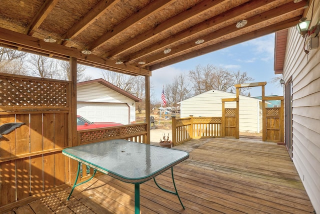 2981 Harrison St, Saginaw, MI 48604 - wooden deck featuring an outdoor structure